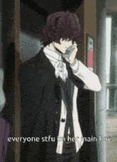 a man in a suit talking on a cell phone with the words everyone stfu im her main hoe below him