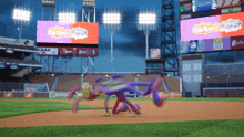 a baseball game is being played in a stadium sponsored by kaak