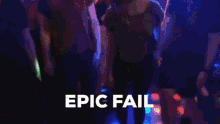 a group of people are dancing in a dark room with the words epic fail written above them