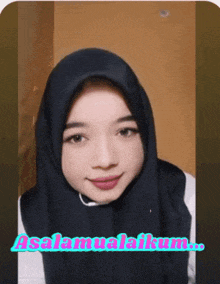 a woman wearing a black hijab with the words " assalamualaikum " on the bottom