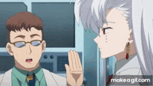 a man and a woman are talking to each other and the woman is giving the man a high five .