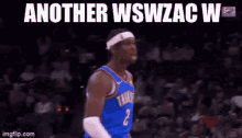a basketball player wearing a headband says another wswzac w .