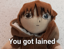a stuffed doll with the words you got lained written on it