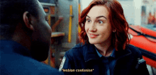 a woman in an ambulance uniform is talking to a man and says " lesbian confusion " in yellow letters