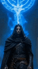 a man in a hooded cloak stands in front of a blue light