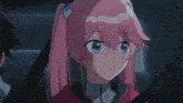 a girl with pink hair and blue eyes is next to a boy with black hair
