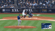 a baseball game is being played between the yankees and the dodgers
