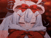 a girl with a red bow on her head and horns