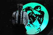a man in a white shirt and black tie stands in front of a green circle with birds on it