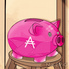 a pink piggy bank with an a on it sits on a stool