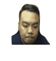 a close up of a man 's face with his eyes closed .