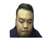 a close up of a man 's face with his eyes closed .