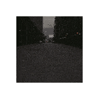 a black and white photo of a brick street with a circle in the middle