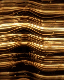 a close up of a gold colored metallic object