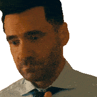 a man with a beard wearing a light blue shirt and tie