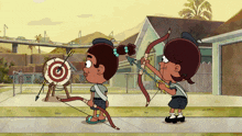 two girls are playing archery and one has a bow and arrow