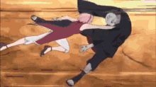 a cartoon of a man and a woman fighting each other .