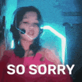 a girl wearing headphones and a headset with the words so sorry behind her