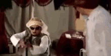 عقال سلاح صيد محمد هنيدي عندليب الدقي بندقية GIF - Mohamed Heneidi Headband Andalib Eldokki Movie GIFs