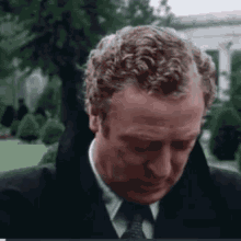 Michael Caine Ashes On Face GIF - Michael Caine Ashes On Face Cough GIFs