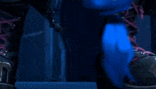a blurred image of a person in a suit