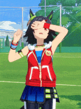 a girl in a red jacket with the letter n on it