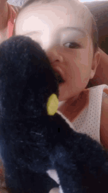 Baby Boy Bite GIF - Baby Boy Bite Stuffed Toy GIFs