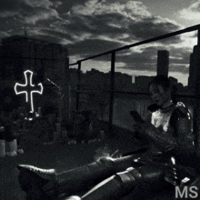 a black and white photo of a woman in armor with the letters ms on the bottom