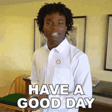 a man wearing a white shirt says have a good day