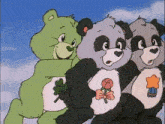 three care bears standing next to each other with one bear holding a rose