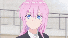 a girl with pink hair and blue eyes is wearing a business suit