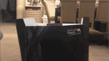 a black box with a nbk logo on it