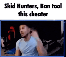 a man is sitting in front of a screen with the words skid hunters , ban tool this cheater written on it .