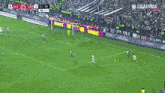 a soccer game is being played in a stadium with ads for liga tmax