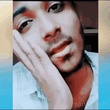 a close up of a man 's face with the word sebi on the bottom right corner