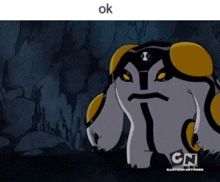 a cartoon character from ben 10 is standing in a cave with a cartoon network logo on the bottom .
