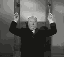 Alfred Hitchcock Guillotine GIF - Alfred Hitchcock Guillotine Workout GIFs