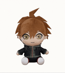 a stuffed toy of a boy with brown hair is laying upside down on a white background