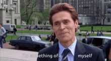 a man in a suit and tie is saying " i 'm something of a myself "