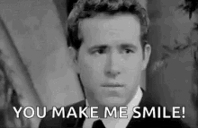 Ryan Reynolds Smirk GIF - Ryan Reynolds Smirk Stare GIFs