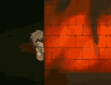 a cartoon character is peeking out from behind a red brick wall
