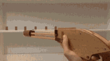 Rubber Band Gun GIF - Rubber Band Gun Target GIFs