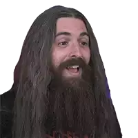 a man with long hair and a beard is making a funny face .