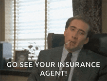 a man in a suit and tie is sitting in a chair smoking a cigarette and saying `` go see your insurance agent ! ''