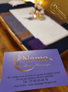 a purple pamphlet for a thai massage place