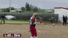a softball game is being played with the score 8 to 0