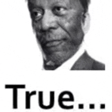 a black and white photo of a man in a suit and tie with the word true .