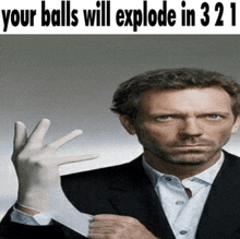 a man wearing a glove with the words your balls will explode in 321 on the top