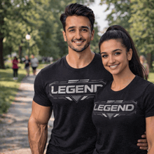 a man and a woman are posing for a picture while wearing legend shirts