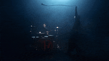a drum set with the letter h on the drum